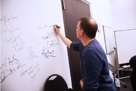 Wyndham Wallace drawing on a board