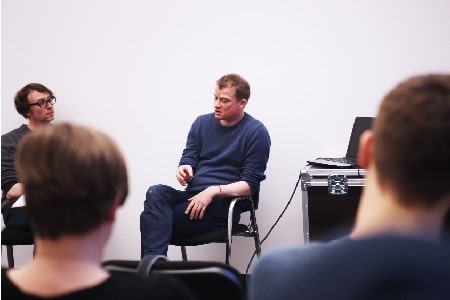 Wyndham Wallace sitting on a chair 