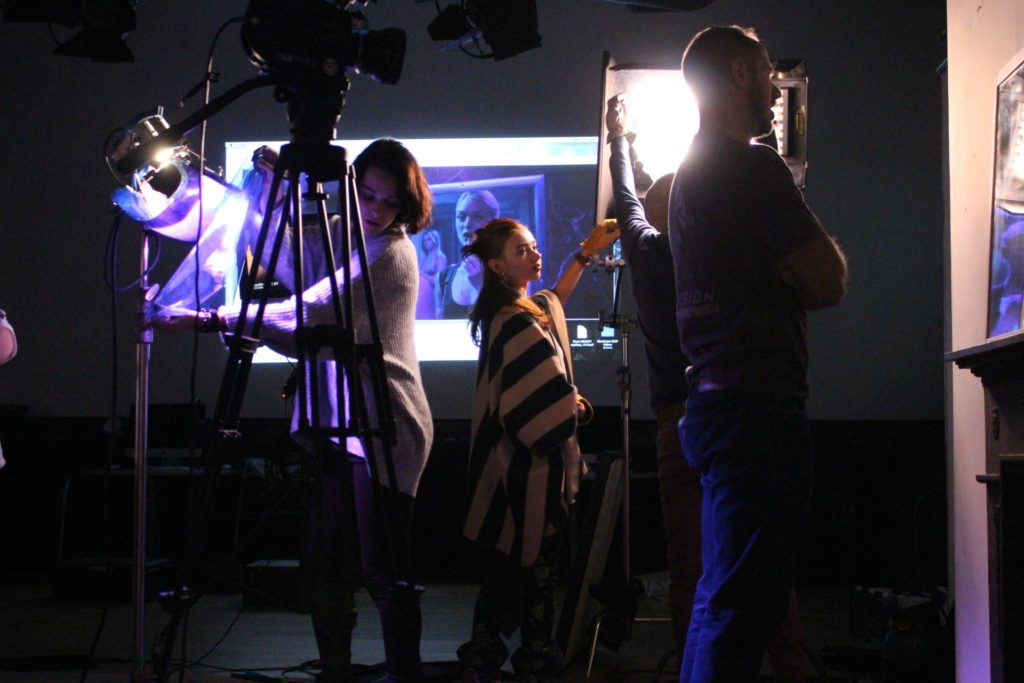 Screen and Film students adjusting lighting