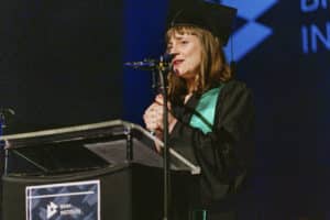 Anna Marks, on stage at the BIMM Berlin graduation 2022