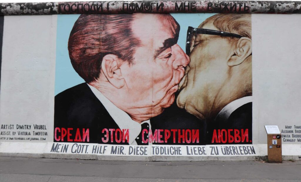 The Berlin Wall featuring My God, Help Me to Survive This Deadly Love